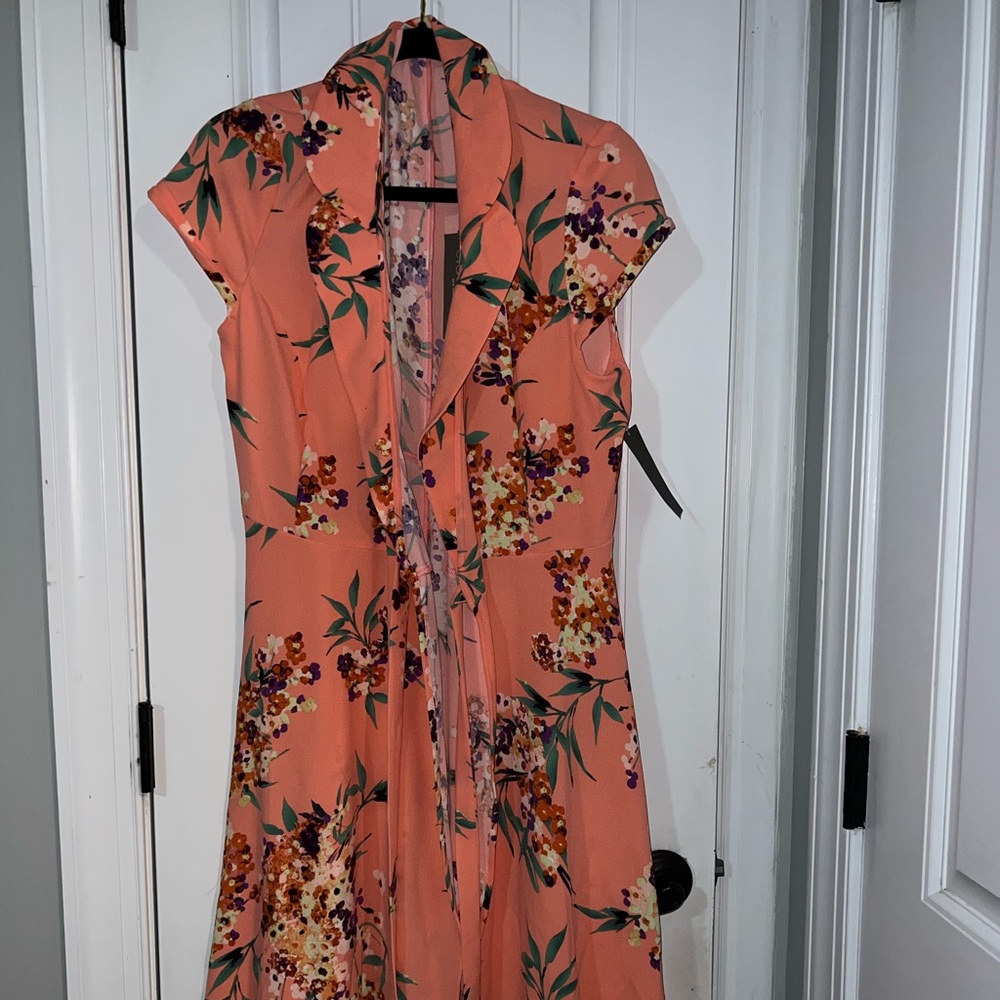 Pretty mid length wrap dress.